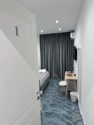 Letto o letti in una camera di FP Suite