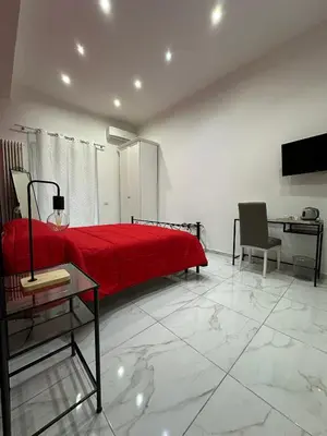 TV o dispositivi per l'intrattenimento presso Santa Chiara Garden View B&B