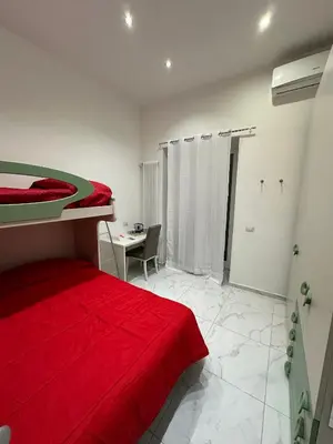 Letto o letti in una camera di Santa Chiara Garden View B&B