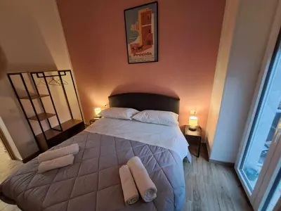 Letto o letti in una camera di Accasamia Neapolitan Apartments