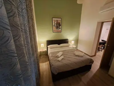 Letto o letti in una camera di Accasamia Neapolitan Apartments
