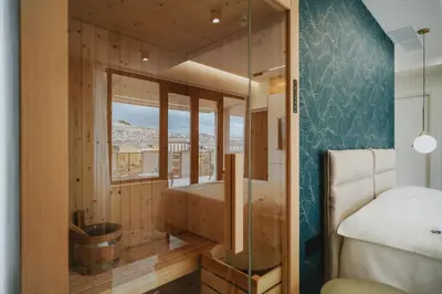 Letto o letti in una camera di POETICA BOUTIQUE SKY HOTEL