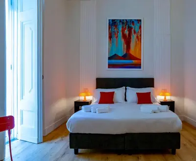 Letto o letti in una camera di Rolando Domus