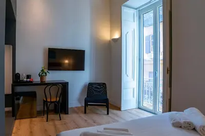 Letto o letti in una camera di Rolando Domus