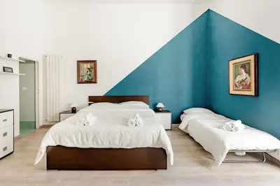 Letto o letti in una camera di Modern 1BR Apt Near National Museum - Sleeps 3