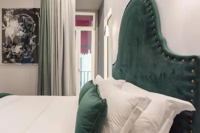 Letto o letti in una camera di Three Rooms Toledo