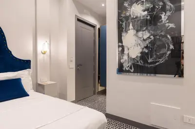 Letto o letti in una camera di Three Rooms Toledo