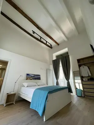 Letto o letti in una camera di NaBi Suite Riviera