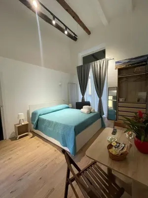 Letto o letti in una camera di NaBi Suite Riviera