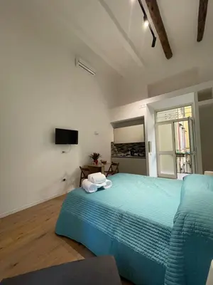 Letto o letti in una camera di NaBi Suite Riviera