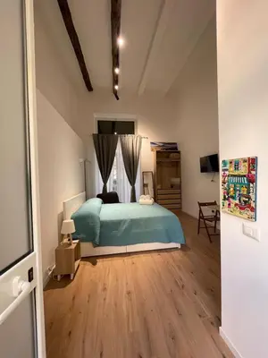 Letto o letti in una camera di NaBi Suite Riviera
