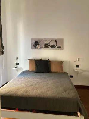 Letto o letti in una camera di La casa di Gigi'
