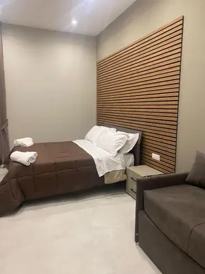 Letto o letti in una camera di DIMORA DEL PLEBISCITO B&b