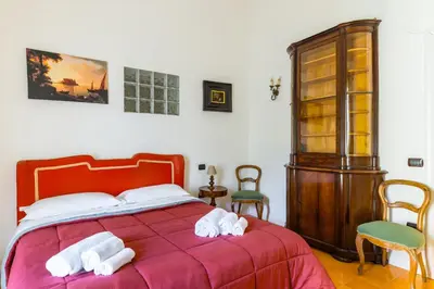 Letto o letti in una camera di Santa Chiara Charming House with Terrace at Historical Center