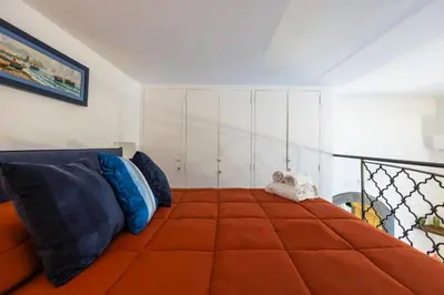 Letto o letti in una camera di Hidden Gem on Chiaia pedastrian area by Napoliapartments