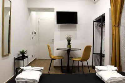 TV o dispositivi per l'intrattenimento presso BlackWoody Contemporary Rooms - Napoli Centro Storico