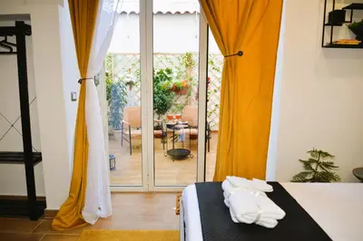 Letto o letti in una camera di BlackWoody Contemporary Rooms - Napoli Centro Storico