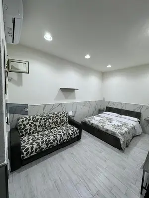 Letto o letti in una camera di CARMELA HOUSE