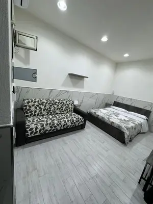 Letto o letti in una camera di CARMELA HOUSE