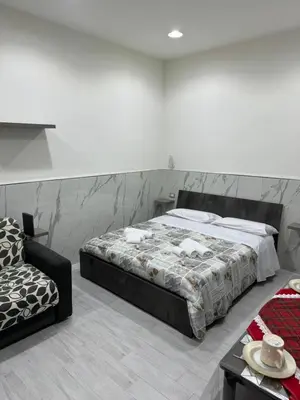 Letto o letti in una camera di CARMELA HOUSE