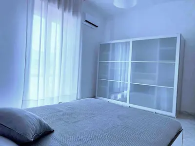 Letto o letti in una camera di Napoli Felix Casa Baby e Pet Friendly
