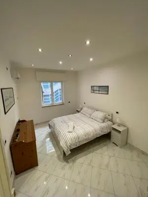 Letto o letti in una camera di Napoli Hub