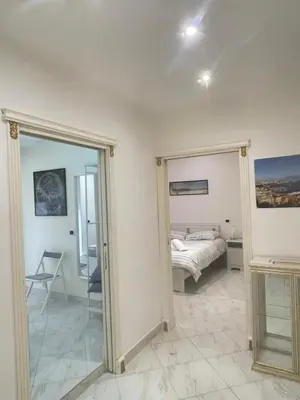 Letto o letti in una camera di Napoli Hub