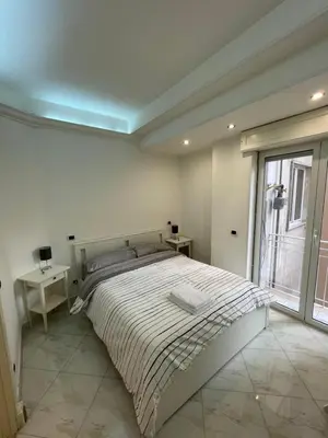 Letto o letti in una camera di Napoli Hub