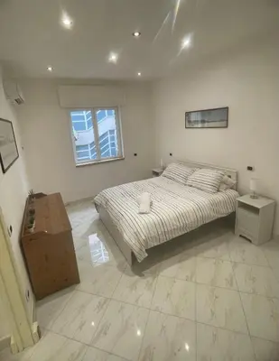 Letto o letti in una camera di Napoli Hub