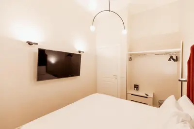 Letto o letti in una camera di Residenza Umberto I