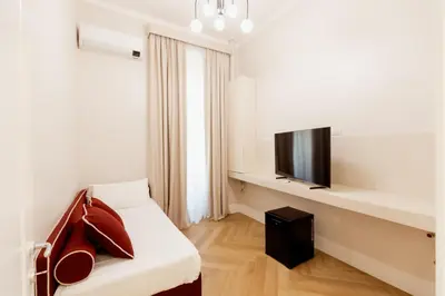 Letto o letti in una camera di Residenza Umberto I