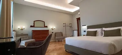 Letto o letti in una camera di Deluxe Spaccanapoli