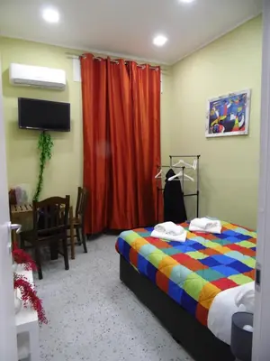 Letto o letti in una camera di Mithra Apartment Centro Storico