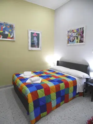 Letto o letti in una camera di Mithra Apartment Centro Storico
