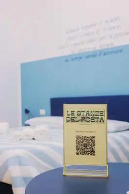 Letto o letti in una camera di Le Stanze Del Poeta Libero Bovio