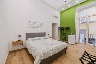 Letto o letti in una camera di Le Stanze del Poeta Salvatore di Giacomo