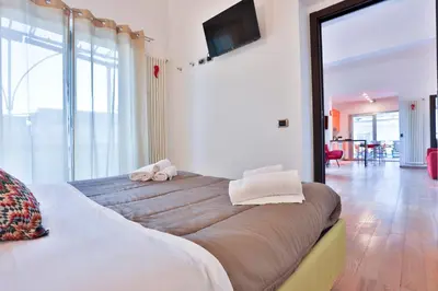 Letto o letti in una camera di Terrazza Concordia Amazing View