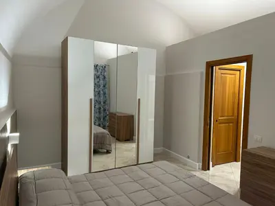 Letto o letti in una camera di TERRAZZINO CORRERA GUEST HOUSE