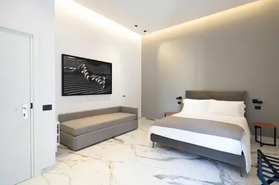 Letto o letti in una camera di InSogno Suites
