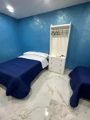 Letto o letti in una camera di Blue House