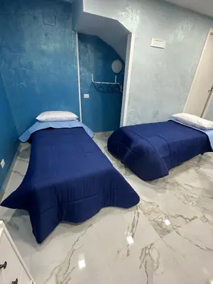 Letto o letti in una camera di Blue House
