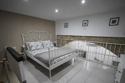 Letto o letti in una camera di GIANNI'S HOME Spaccanapoli
