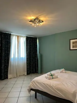 Letto o letti in una camera di Casa Mia nel cuore di Napoli