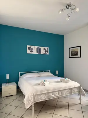 Letto o letti in una camera di Casa Mia nel cuore di Napoli