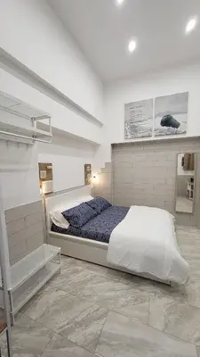 Letto o letti in una camera di Il Biscottino rooms