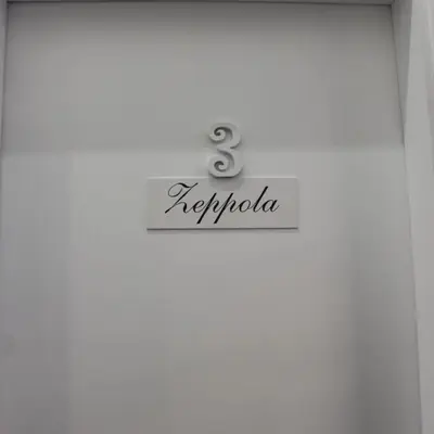 Certificato, attestato, insegna o altro documento esposto da Il Biscottino rooms