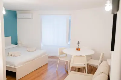Letto o letti in una camera di Casetta Vacanze Partenope