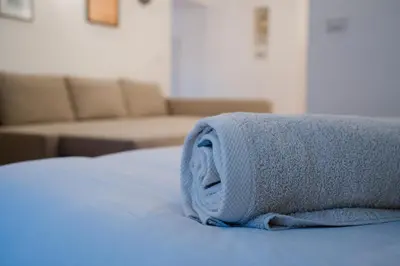 Letto o letti in una camera di Casetta Vacanze Partenope