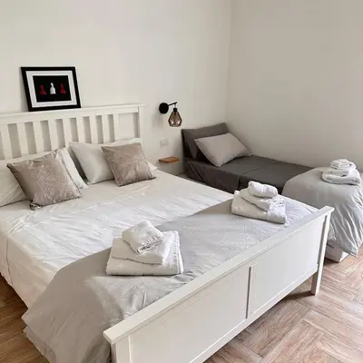 Letto o letti in una camera di Donna Flora’s House