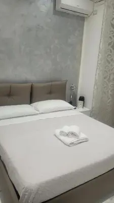 Letto o letti in una camera di Bella Napoli